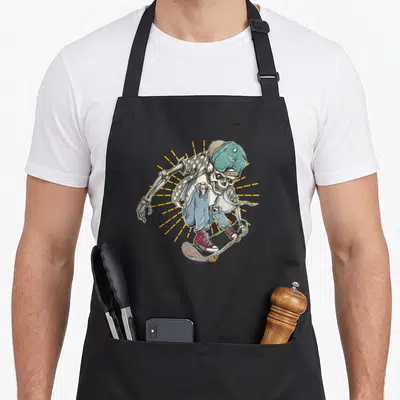 Cute skateboard skateboarding lover apron - Cartoon skeleton wearing teal cap and red shoes riding a skateboard — shown on a black cotton canvas apron against a white background