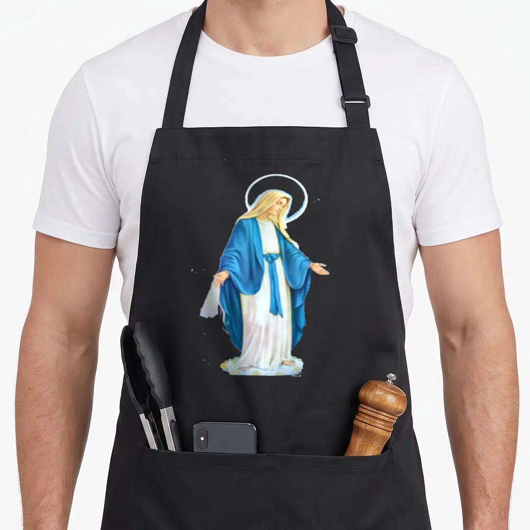 Feast mother's apron - Realistic Virgin Mary standing on cloud wearing blue robe and white dress with gold halo — shown on a black cotton canvas apron against a white background