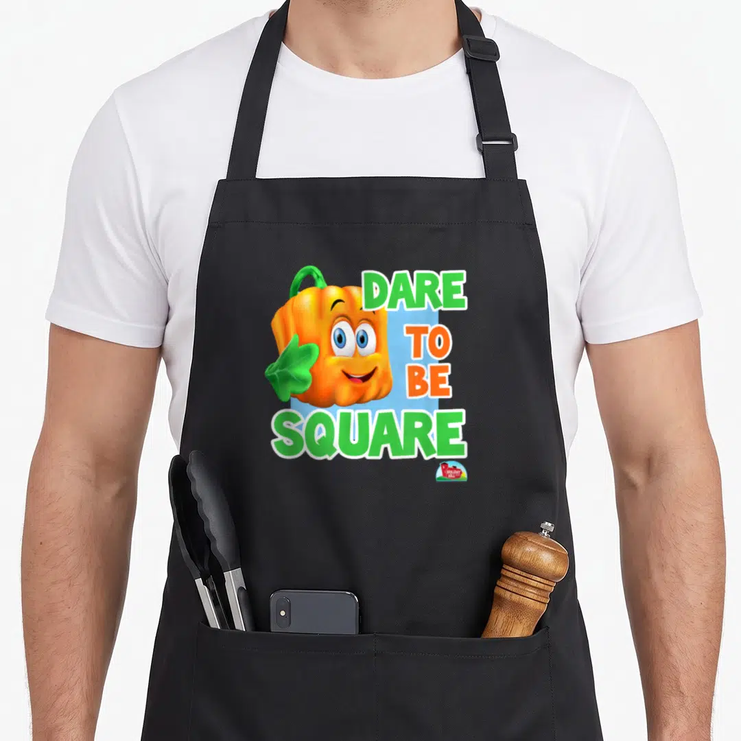 Spookley halloween kitchen aprons - Square orange pumpkin with green leaf and Dare To Be Square text on blue background — shown on a black cotton canvas apron against a white background