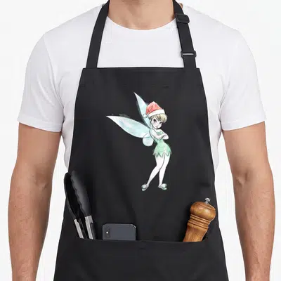 Peter santa aprons - Cartoon fairy with light blue wings wearing a red Santa hat and green dress with arms crossed — shown on a black cotton canvas apron against a white background