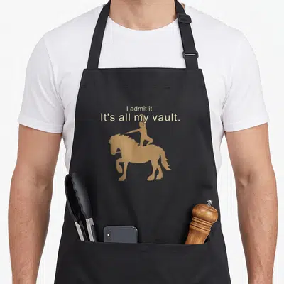 Vault horse apron - Tan silhouette of person vaulting on horse below two lines of text reading I admit it It's all my — shown on a black cotton canvas apron against a white background