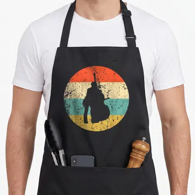 Stand bass apron - Grey double bass player silhouette over four horizontal red cream teal and yellow bands — shown on a black cotton canvas apron against a white background