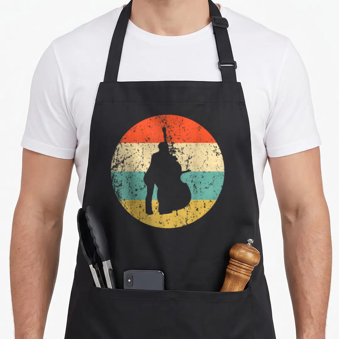 Stand bass apron - Grey double bass player silhouette over four horizontal red cream teal and yellow bands — shown on a black cotton canvas apron against a white background