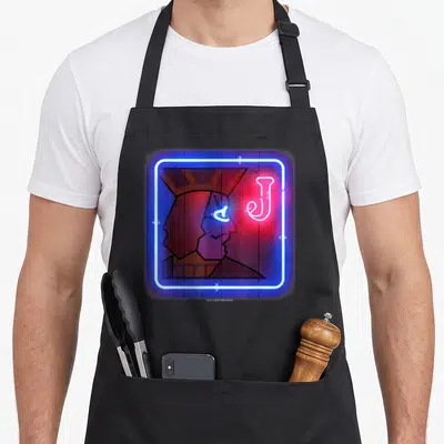 Eyed twin peaks apron - Stylized red face in blue neon square with pink J and small blue flame — shown on a black cotton canvas apron against a white background