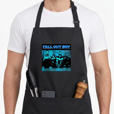 Funny grave fall apron - Blue Fall Out Boy text above photo of four men sitting on wood floor against brick wall — shown on a black cotton canvas apron against a white background