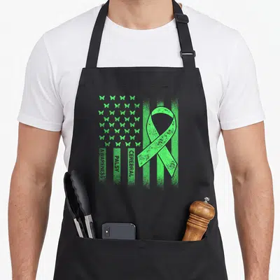 Flag cerebral palsy awareness apron - Lime green ribbon and butterflies forming a flag with vertical Cerebral Palsy — shown on a black cotton canvas apron against a white background
