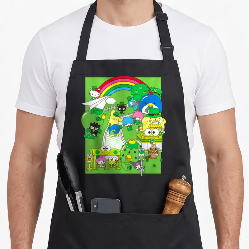 Seeing st patrick day aprons - Sanrio characters in green hats under a rainbow near a bus stop sign — shown on a black cotton canvas apron against a white background
