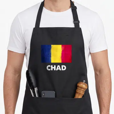 Jersey chad apron - Distressed blue yellow red flag above white CHAD text — shown on a black cotton canvas apron against a white background