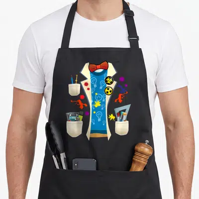 Physic halloween apron - Beige lab coat with blue shirt, red bow tie, biohazard symbols, and paint splatters in cartoon — shown on a black cotton canvas apron against a white background