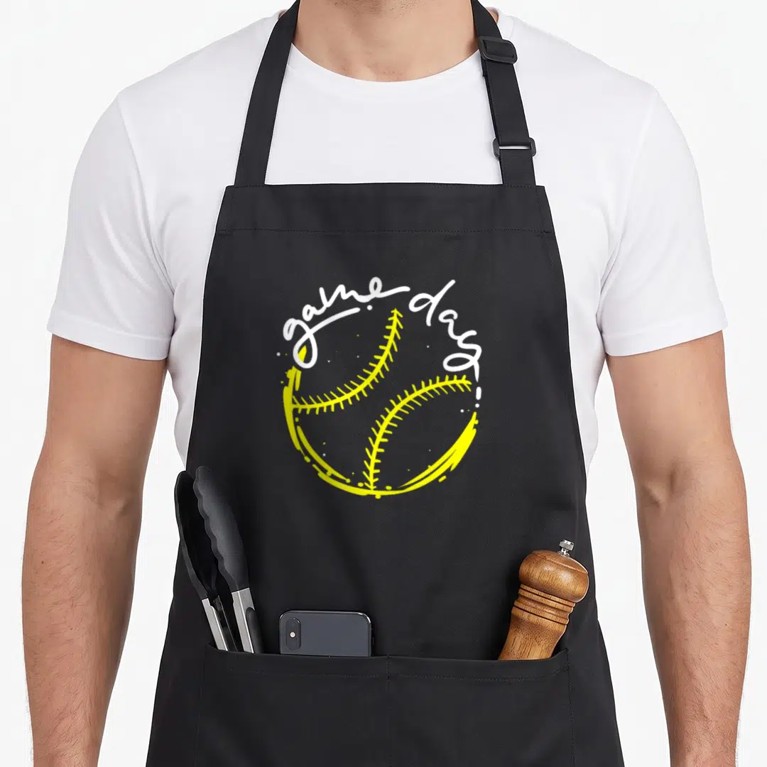 Game baseball apron - Yellow softball with white game day script in line art style — shown on a black cotton canvas apron against a white background