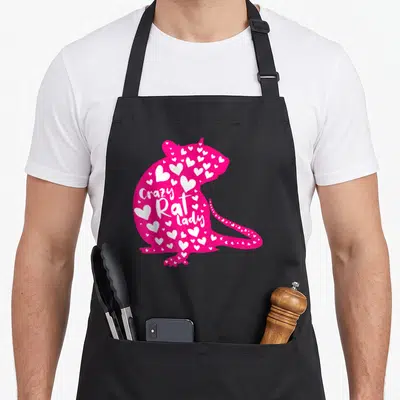 Rat fancy apron - Pink rat silhouette filled with white hearts and white text reading Crazy Rat Lady — shown on a black cotton canvas apron against a white background