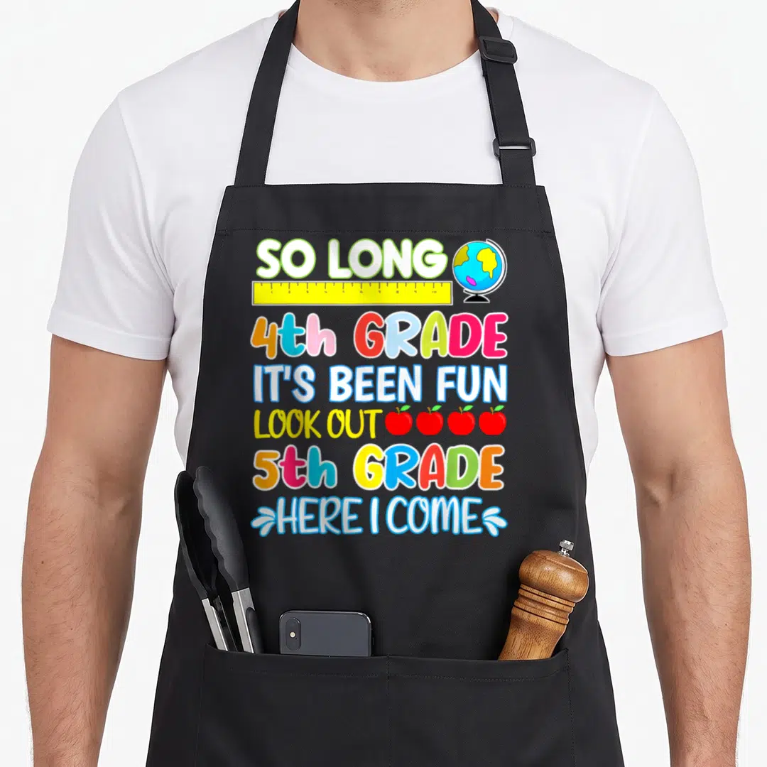 4th come and get it apron - Stacked text reading So Long 4th Grade Here I Come with globe, ruler, and four red apples — shown on a black cotton canvas apron against a white background