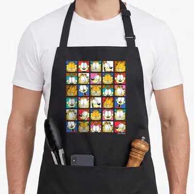 Expression cartoon apron - 5x6 grid of Garfield cartoon faces on orange, blue, red, and pink backgrounds — shown on a black cotton canvas apron against a white background