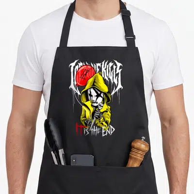Silence ice nine kills apron - Masked figure in yellow hoodie holding skull knife with red balloon and IT IS THE END — shown on a black cotton canvas apron against a white background