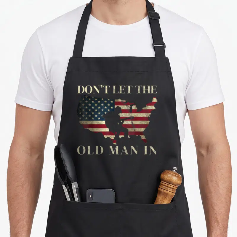 Retro american flag apron - Distressed USA map with flag pattern, guitarist silhouette, and beige text reading DON'T — shown on a black cotton canvas apron against a white background