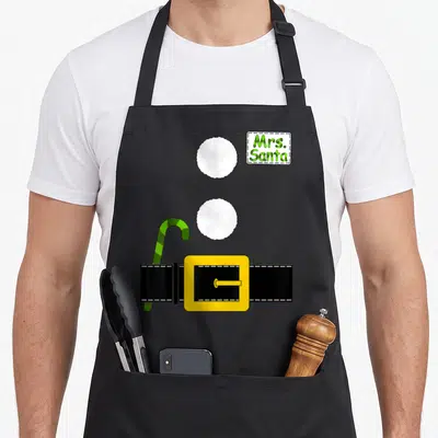 Santa mr mrs aprons - Mrs. Santa text above candy cane and yellow buckle belt illustration — shown on a black cotton canvas apron against a white background
