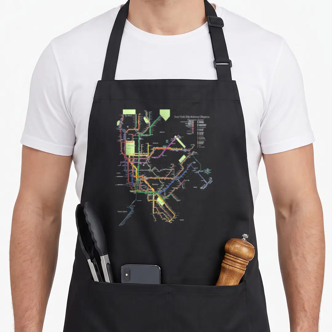 Metro new york apron - New York City Subway Diagram with colored lines and borough labels like Manhattan and Queens — shown on a black cotton canvas apron against a white background
