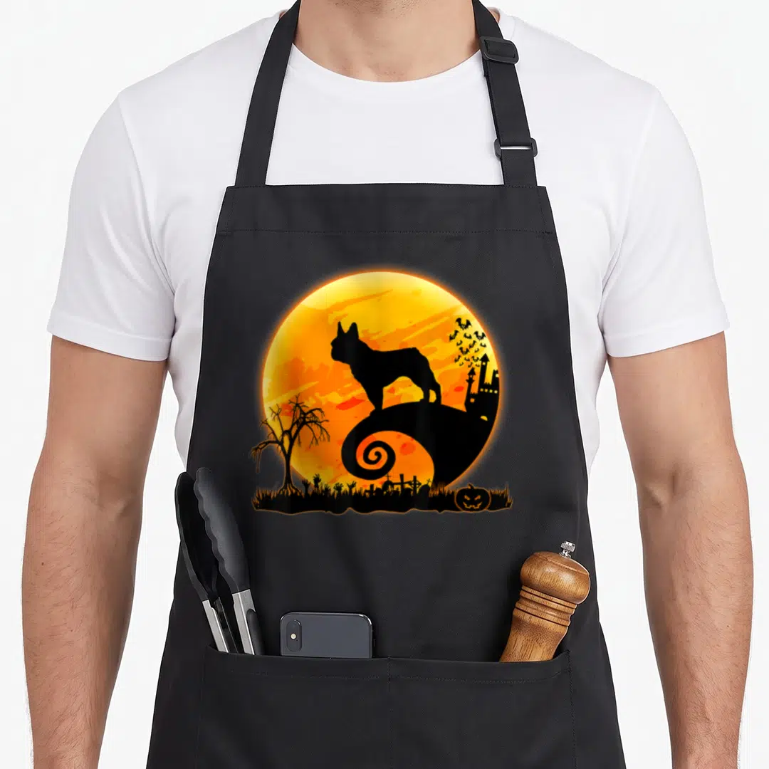 Moon cheap halloween aprons - Black French Bulldog silhouette on orange moon with graveyard, castle, and pumpkin — shown on a black cotton canvas apron against a white background