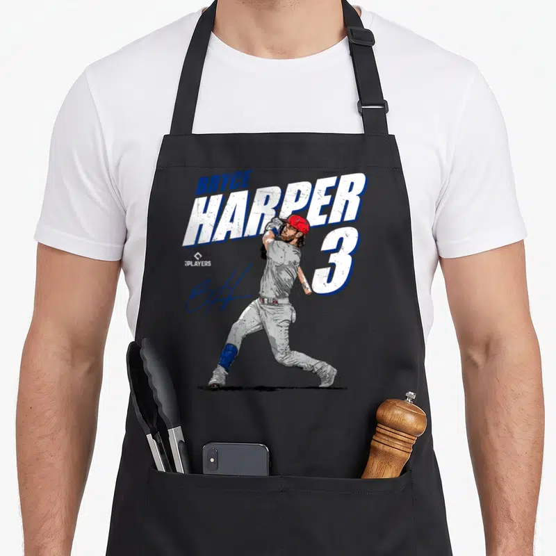 Harper philadelphia apron - Realistic Bryce Harper batting with name, number 3, and blue signature on grey background — shown on a black cotton canvas apron against a white background