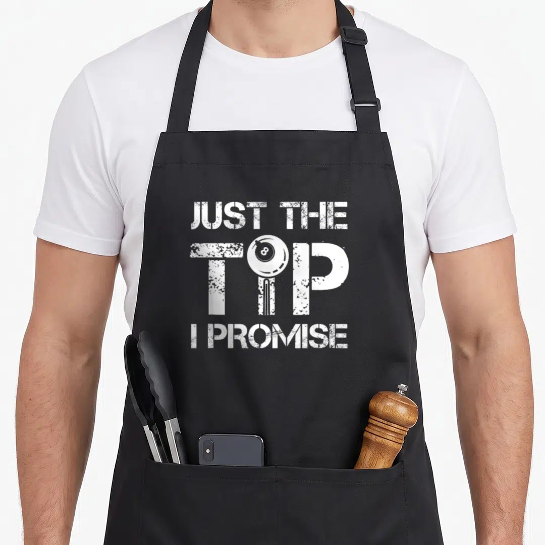 Tip snooker apron - Distressed white text Just The Tip I Promise with 8-ball replacing the letter I — shown on a black cotton canvas apron against a white background