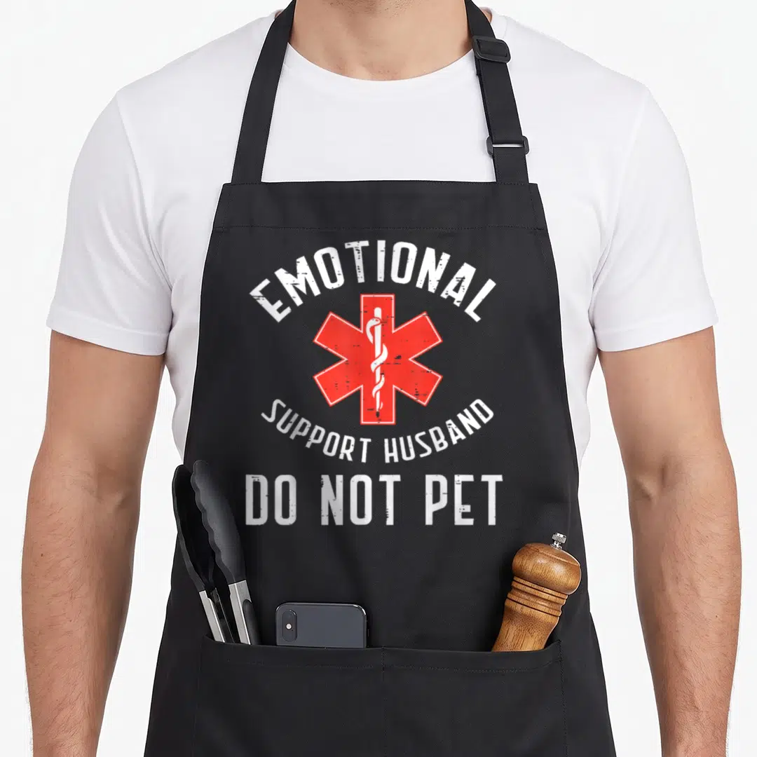 Emotional father day apron - Red Star of Life with emotional support husband do not pet text — shown on a black cotton canvas apron against a white background