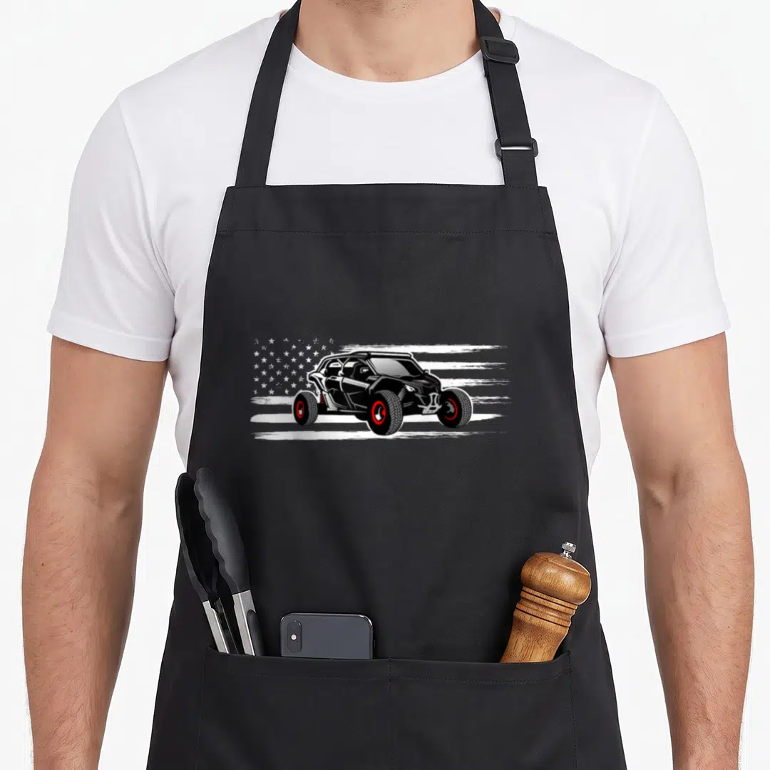 Utv american flag apron - Black UTV with red rims on distressed white flag brushstrokes — shown on a black cotton canvas apron against a white background