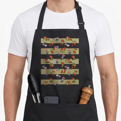 Toss novelty apron - Cartoon fox and rabbit pattern on four tan stripes with orange grey blue accents — shown on a black cotton canvas apron against a white background