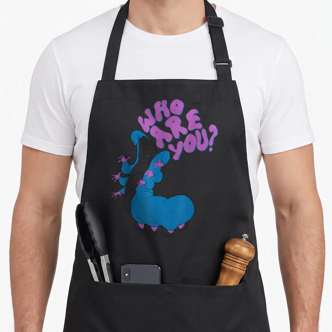 Funny alice wonderland apron - Blue caterpillar with pink hands and pink WHO ARE YOU text arching above — shown on a black cotton canvas apron against a white background