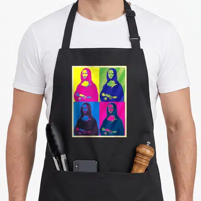 Vinci mona lisa apron - Four pop art Mona Lisa portraits in magenta, cyan, yellow, and green grid layout — shown on a black cotton canvas apron against a white background