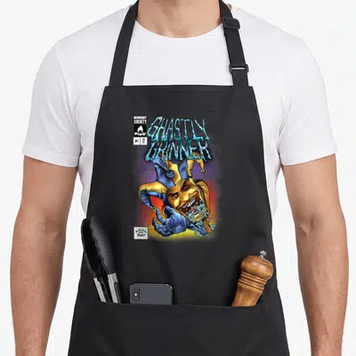 Ghastly clown aprons - Ghastly Grinner jester with blue text and comic box reading Midnight Society 1994 — shown on a black cotton canvas apron against a white background