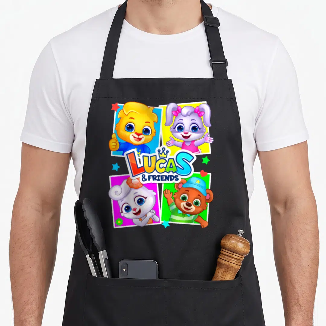 Lucas friends apron - Four cartoon animals in colored squares with LUCAS & FRIENDS text and crown — shown on a black cotton canvas apron against a white background