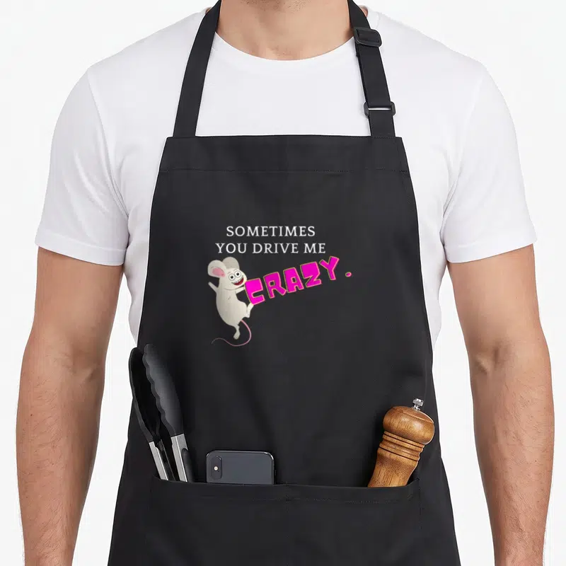Sometime crazy mouse lady apron - Cartoon mouse next to stacked white text and large pink CRAZY letters on grey — shown on a black cotton canvas apron against a white background