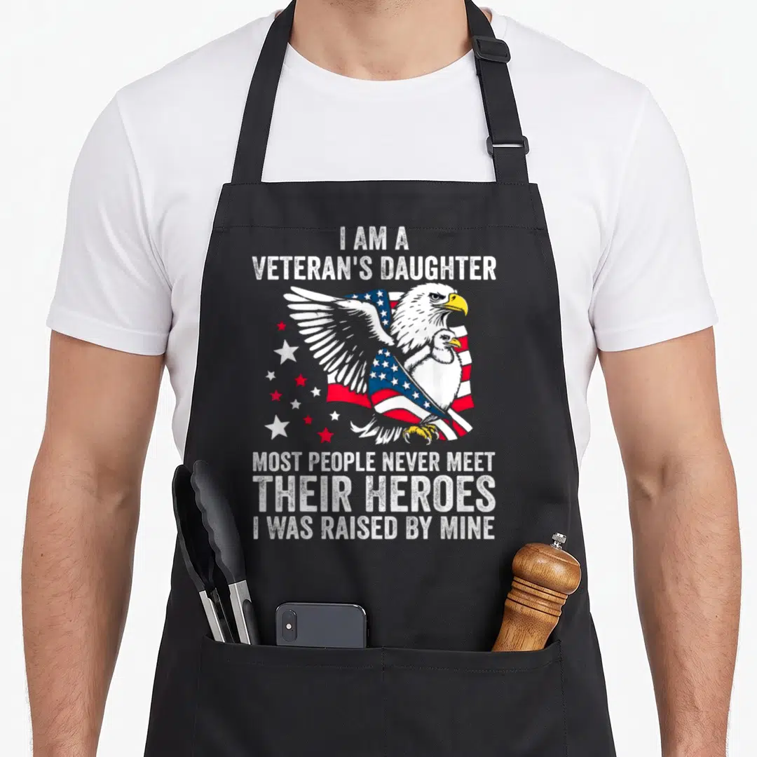 Most people meet apron - Bald eagle protecting chick with veteran daughter quote and stars — shown on a black cotton canvas apron against a white background