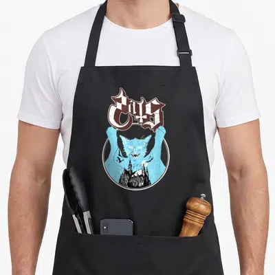 Ghost cat apron - Gothic Cats text above blue cat silhouette containing black cathedral, bats, moon, and lightning — shown on a black cotton canvas apron against a white background