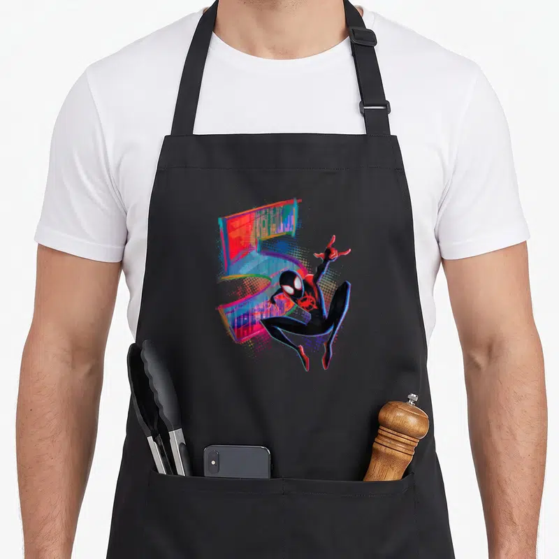 Morale birthday apron - Spider-Man in black red and blue suit over glitch art number five — shown on a black cotton canvas apron against a white background
