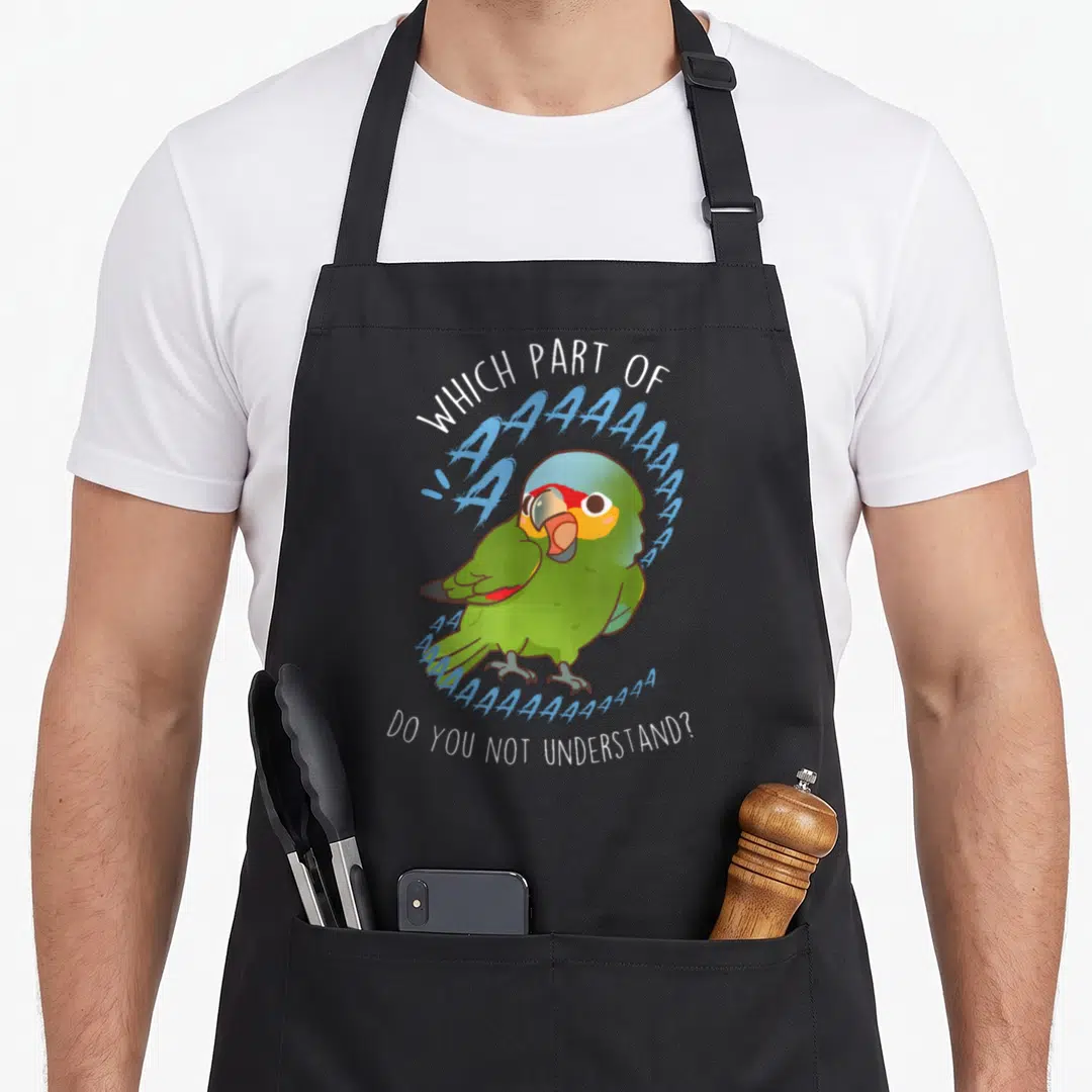 Lored bird apron - Cartoon green parrot screaming blue A's with white sarcastic text — shown on a black cotton canvas apron against a white background