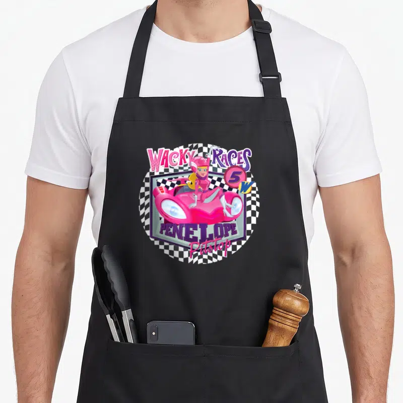Wacky cartoon apron - Penelope Pitstop pink car Wacky Races 5 Pitstop checkered circle — shown on a black cotton canvas apron against a white background