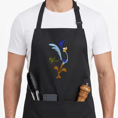 Cute runner road apron - Cartoon Road Runner in blue yellow brown with Road Runner text overlay on left side — shown on a black cotton canvas apron against a white background