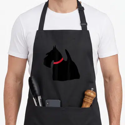 Terrier collar dog apron - Black dog silhouette with red collar facing left — shown on a black cotton canvas apron against a white background