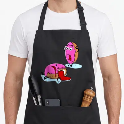 Dead donut apron - Two cartoon donuts, one standing shocked, one lying in red puddle, pink and brown — shown on a black cotton canvas apron against a white background