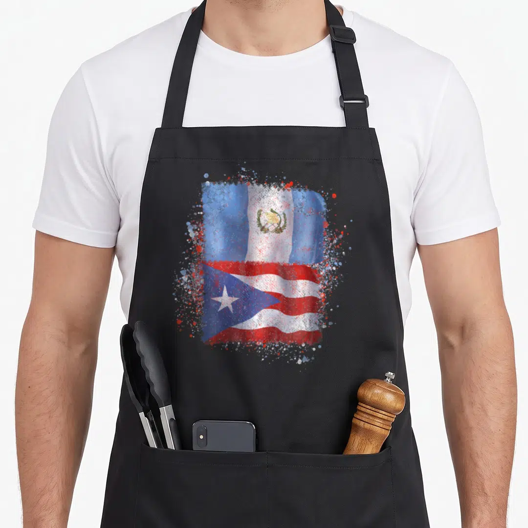 Rican guatemalan aprons - Watercolor Dominican and Puerto Rico flags with blue white red splatter effect — shown on a black cotton canvas apron against a white background