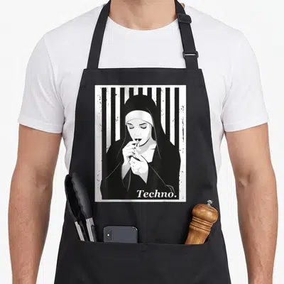 Nun techno apron - Minimalist nun illustration against vertical black stripes with Techno text below — shown on a black cotton canvas apron against a white background