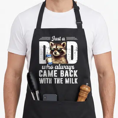 Vintage raccoon milk aprons - Realistic raccoon wearing sunglasses holding a blue and white milk carton with stacked — shown on a black cotton canvas apron against a white background
