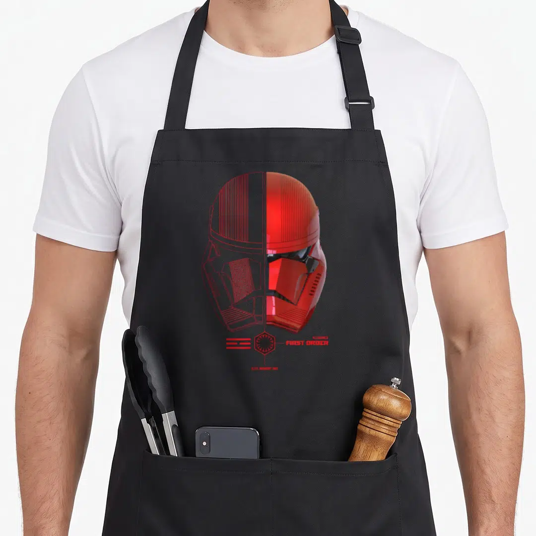 Episode novelty apron - Red split stormtrooper helmet with First Order text and hexagonal logo — shown on a black cotton canvas apron against a white background