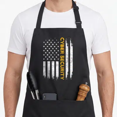 Cybersecurity us aprons - Vertical yellow CYBER SECURITY text overlaid on distressed white USA flag stripes and stars — shown on a black cotton canvas apron against a white background