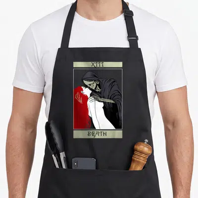 Tarot wiccan apron - XIII DEATH tarot card illustration with Grim Reaper kissing red-haired woman in black and red line — shown on a black cotton canvas apron against a white background