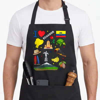 Hand ecuadorian apron - Cartoon collage of Ecuador flag, toucan, tortoise, map, and heart with ECUADOR text — shown on a black cotton canvas apron against a white background