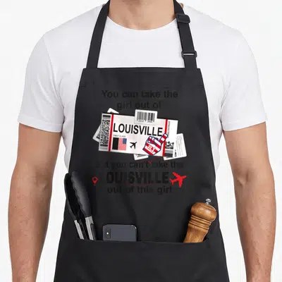 Louisville boarding apron - Boarding pass with foam finger and text You can take the girl out of Louisville on black — shown on a black cotton canvas apron against a white background