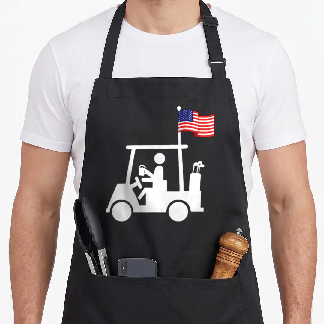 Strong golf apron - White golf cart silhouette with USA flag and beer mug on black bib — shown on a black cotton canvas apron against a white background