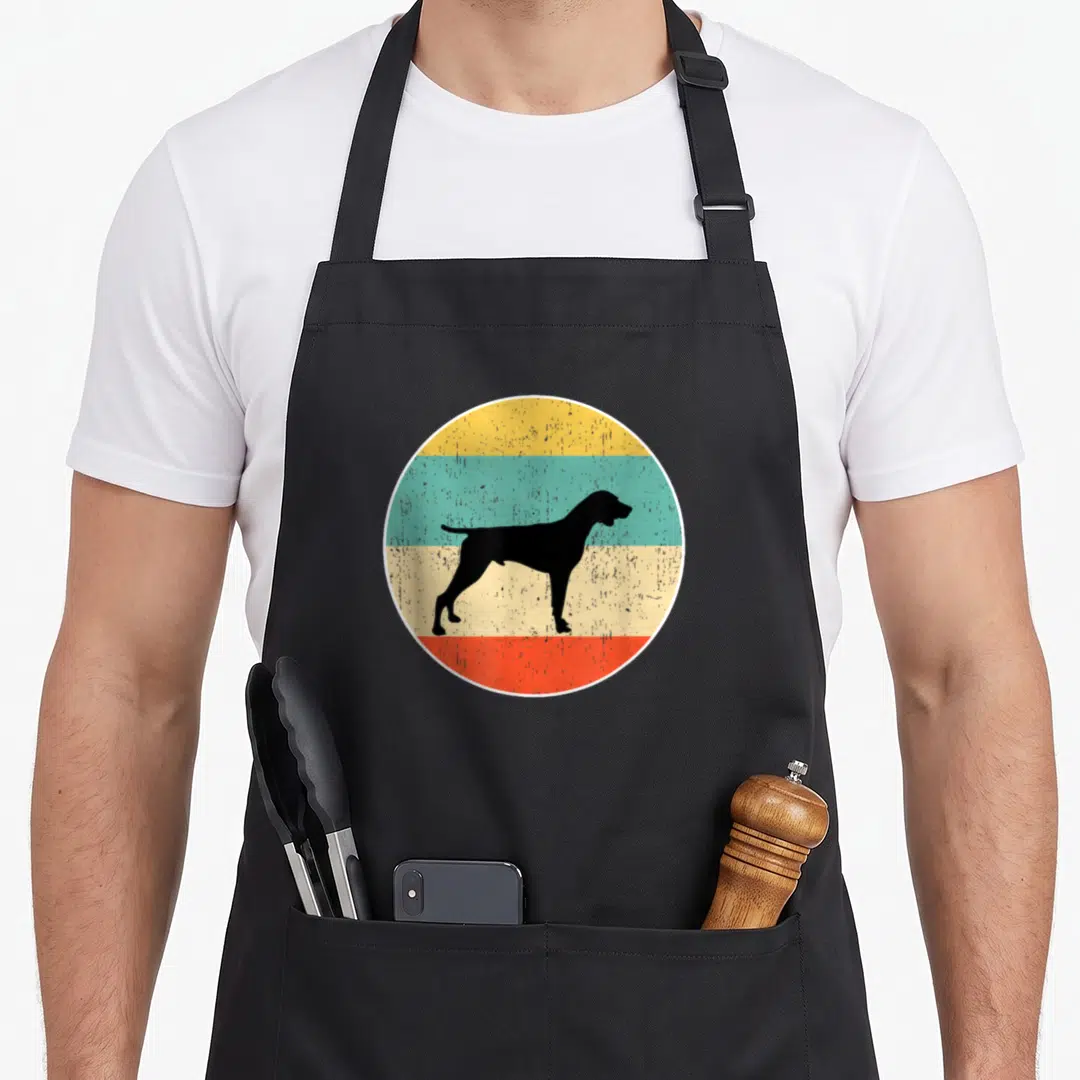 German shorthaired pointer dog apron - Black dog silhouette over four horizontal stripes in yellow teal beige and red — shown on a black cotton canvas apron against a white background